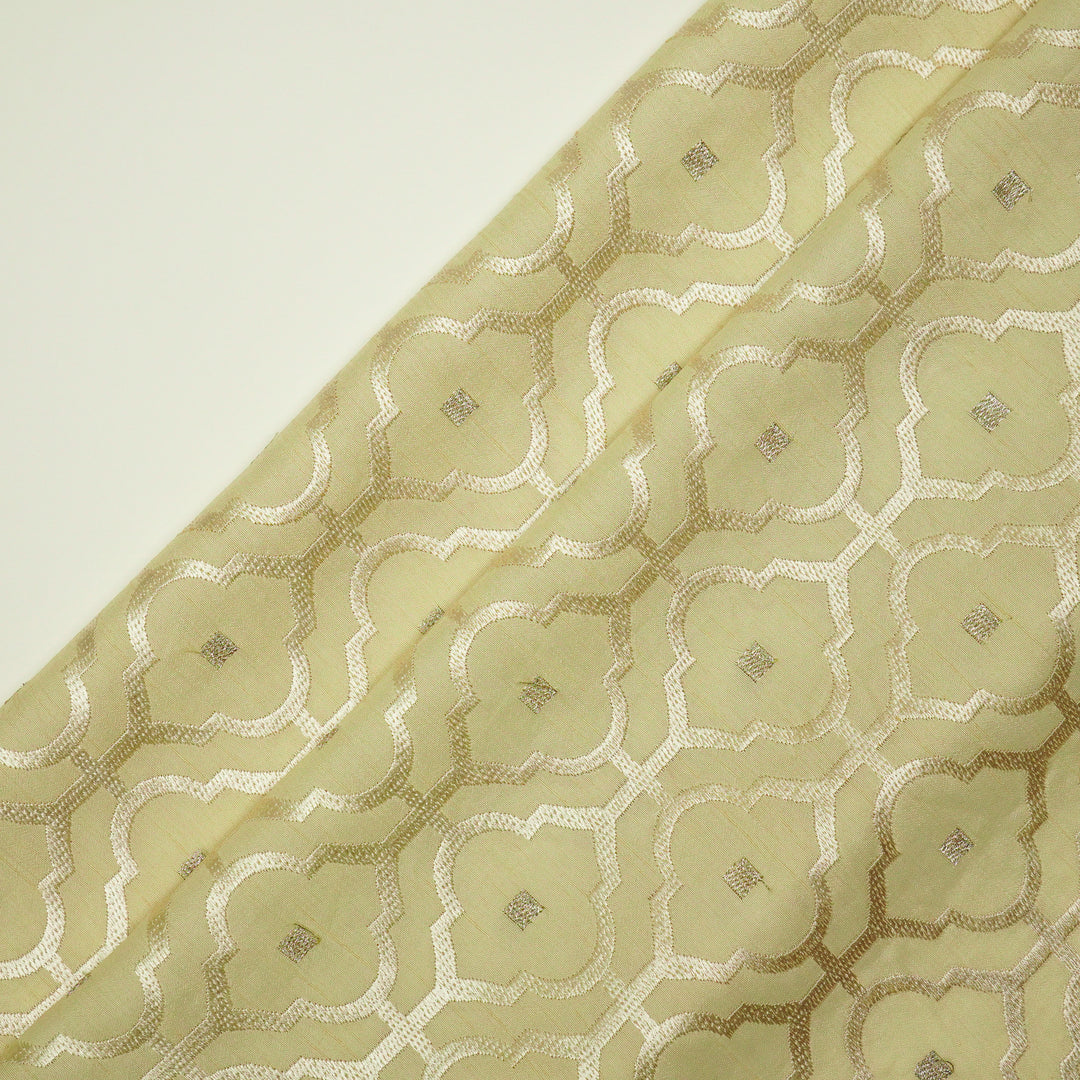 Jahanara Jaal on Cream Semi Raw Silk Embroidered Fabric