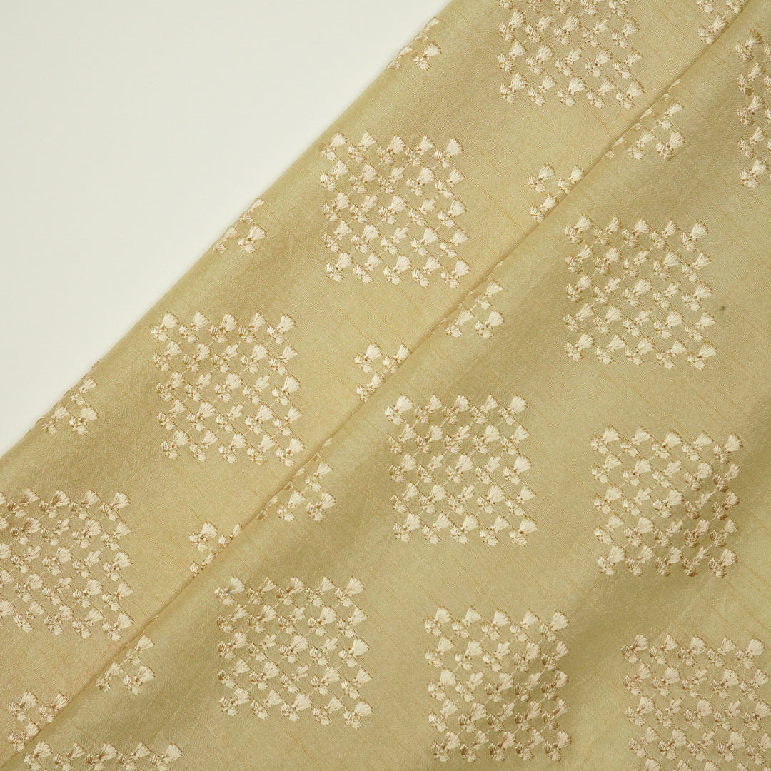 Zyra Buta on Beige Semi Raw Silk Embroidered Fabric