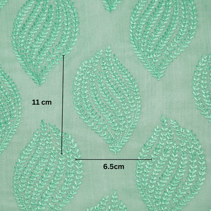 Avira Buta on Mint Green Munga Silk Embroidered Fabric