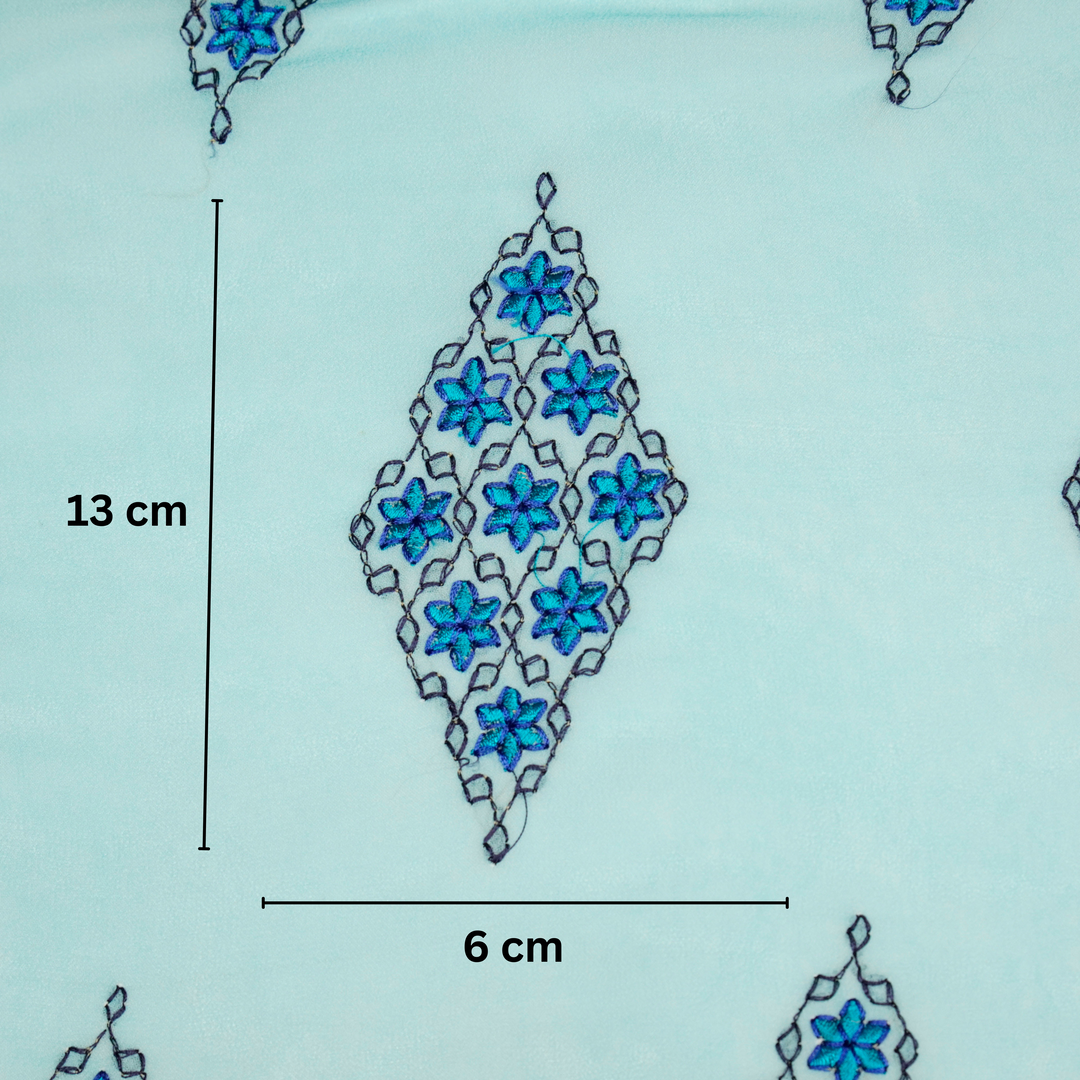 Aseela Buta on Aqua Semi Georgette Embroidered Fabric