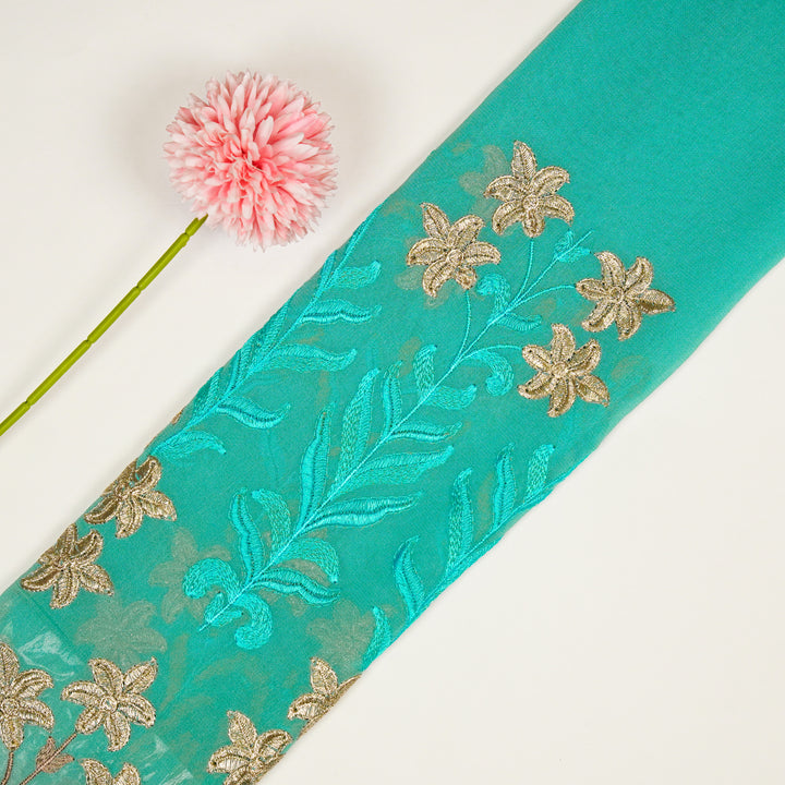 Dalisha Jaal on Aqua Semi Georgette Embroidered Fabric