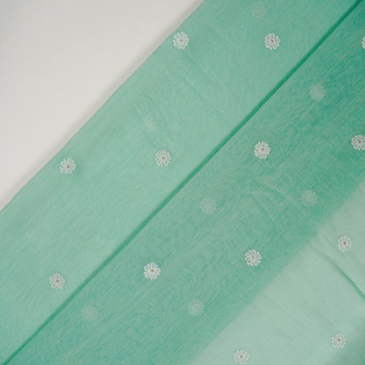 Komala Buti on Aqua Cotton Silk Embroidered Fabric