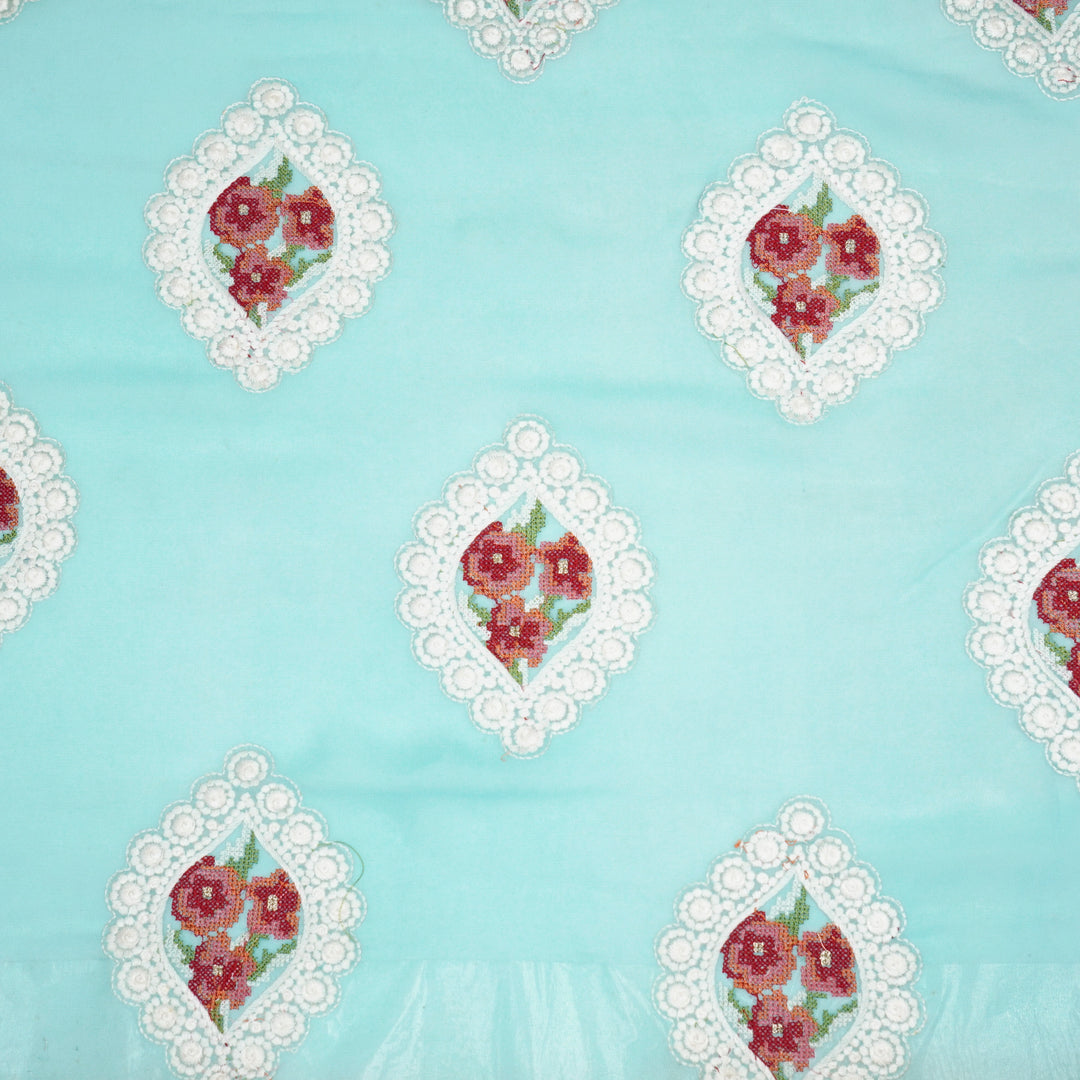 Zinal Buta on Turquoise Semi Georgette Embroidered Fabric