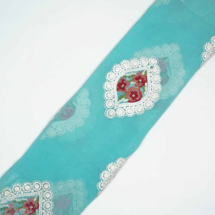 Zinal Buta on Turquoise Semi Georgette Embroidered Fabric