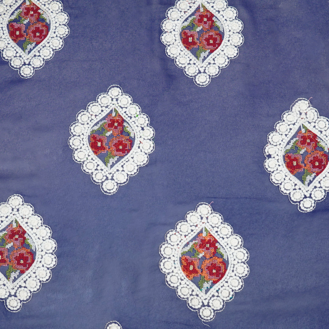 Zinal Buta on Royal Blue Semi Georgette Embroidered Fabric