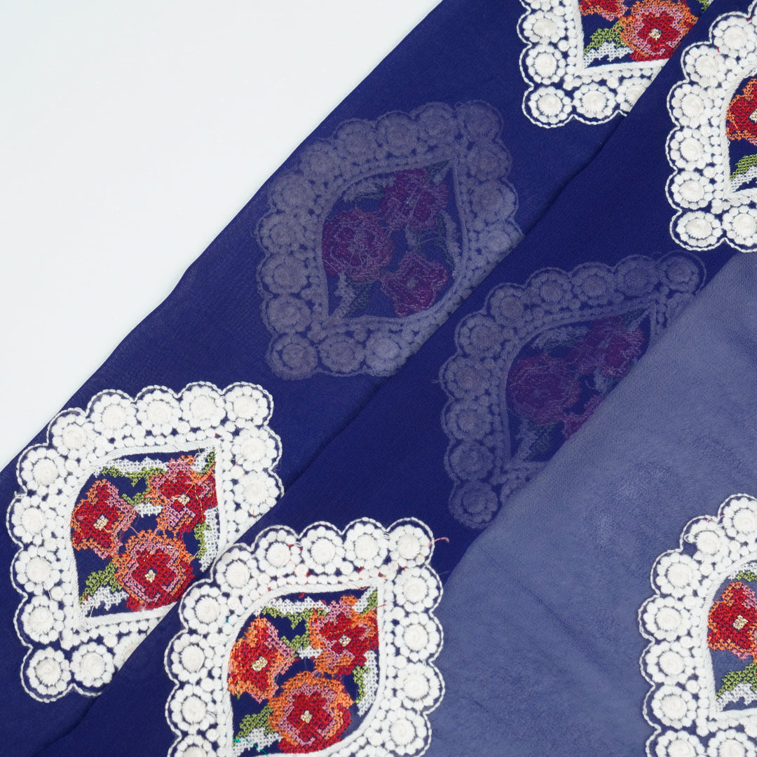 Zinal Buta on Royal Blue Semi Georgette Embroidered Fabric