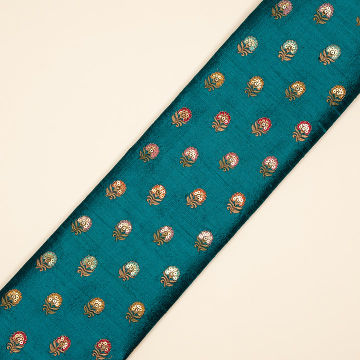 Gulfi Buti on Peacock Blue Raw Silk Embroidered Fabric