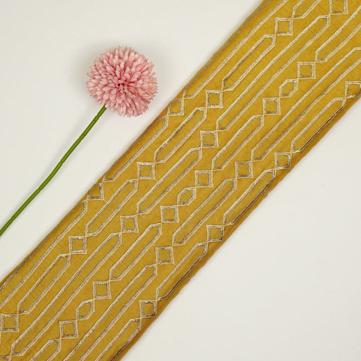 Tanira Jaal on Gold Semi Raw Silk Embroidered Fabric