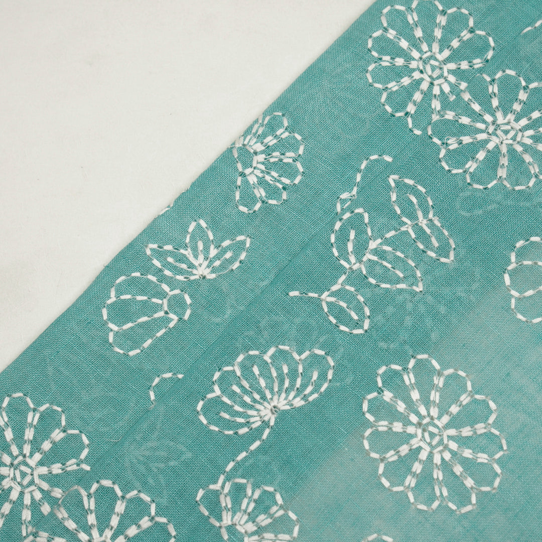 Adrija Floral Jaal on Turquoise Gauged Linen Embroidered Fabric