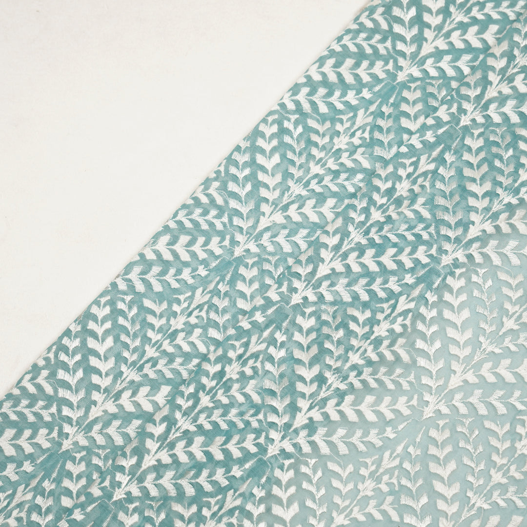 Aaditree Jaal on Light Turquoise Cotton Silk Embroidered Fabric
