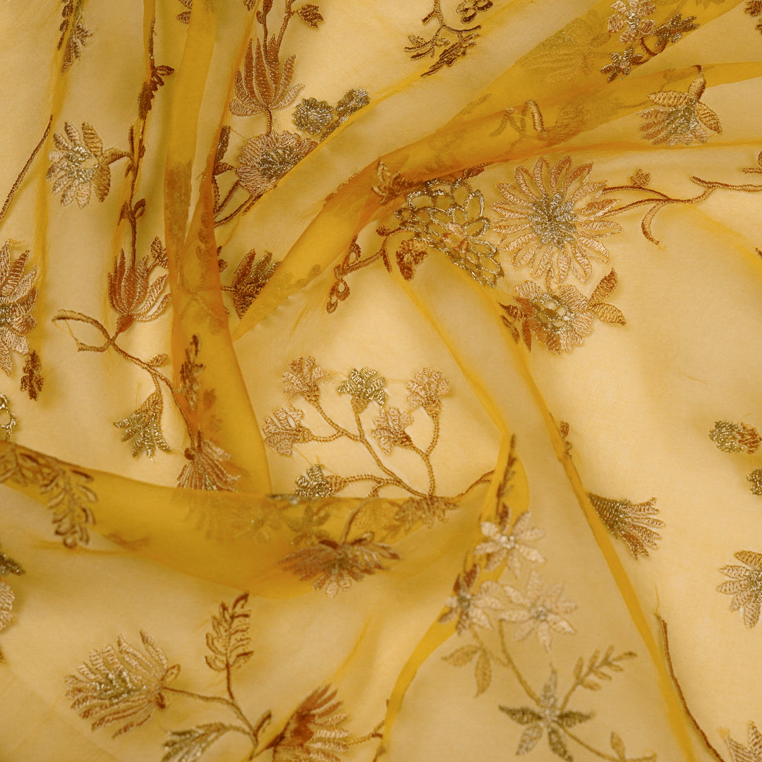 Komal Buta on Gold Silk Organza Embroidered Fabric