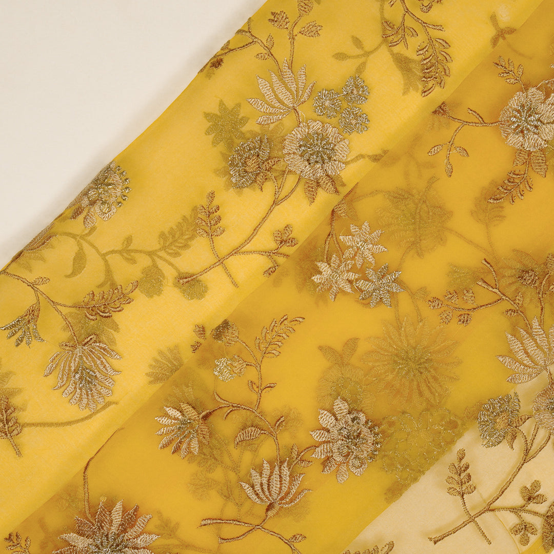 Komal Buta on Gold Silk Organza Embroidered Fabric