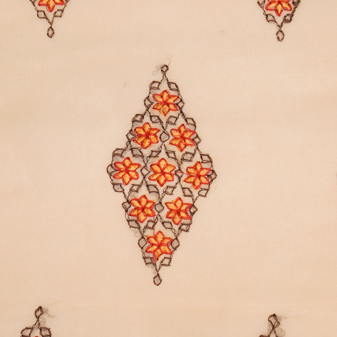 Aseela Buta on Light Peach Semi Georgette Embroidered Fabric