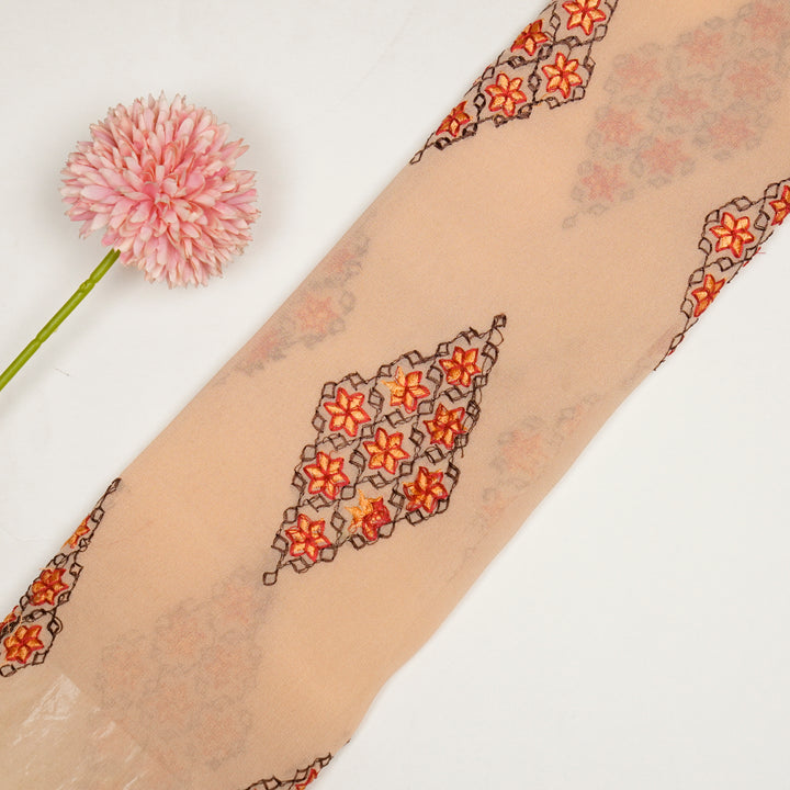 Aseela Buta on Light Peach Semi Georgette Embroidered Fabric