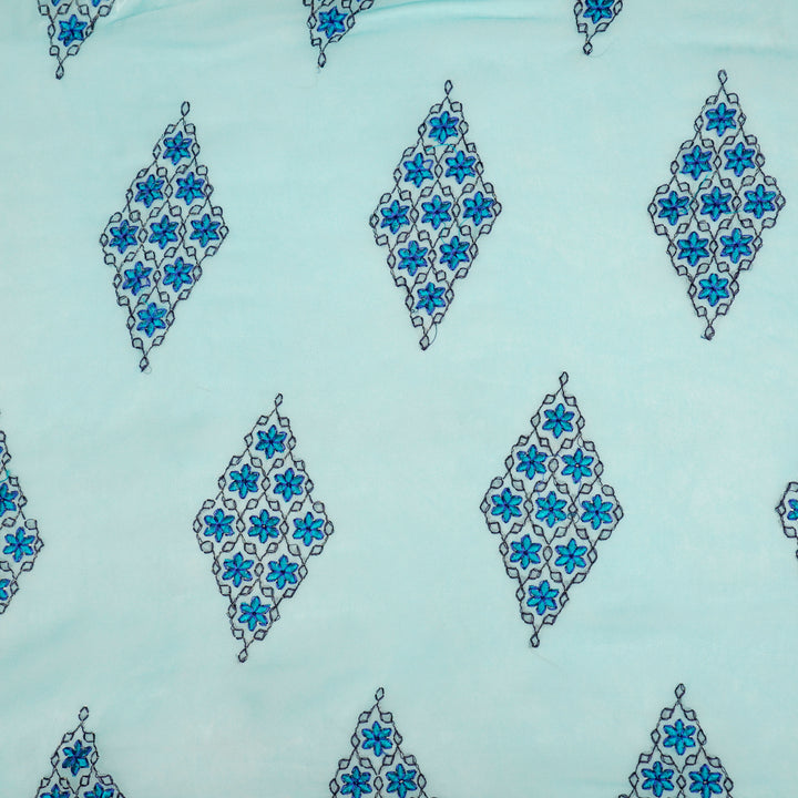 Aseela Buta on Aqua Semi Georgette Embroidered Fabric