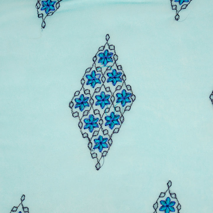 Aseela Buta on Aqua Semi Georgette Embroidered Fabric