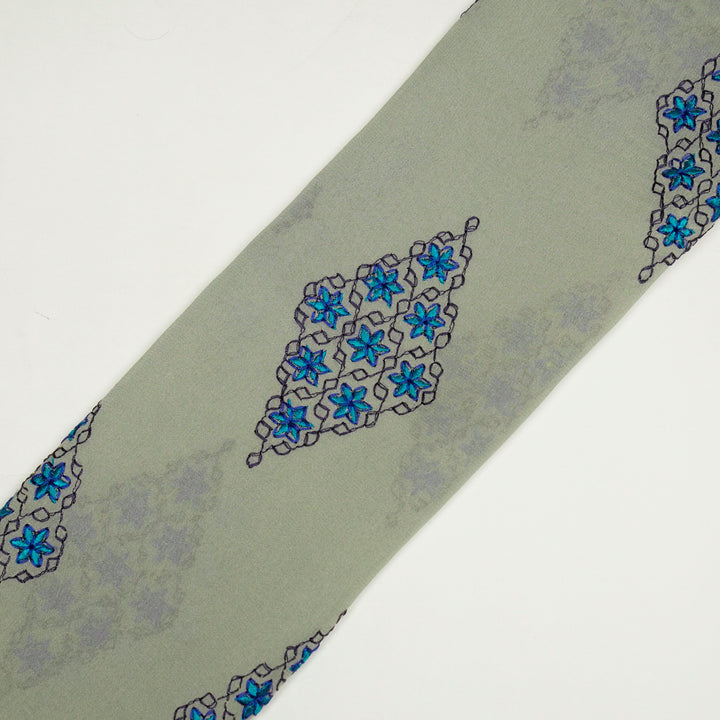 Aseela Buta on Light Grey Semi Georgette Embroidered Fabric