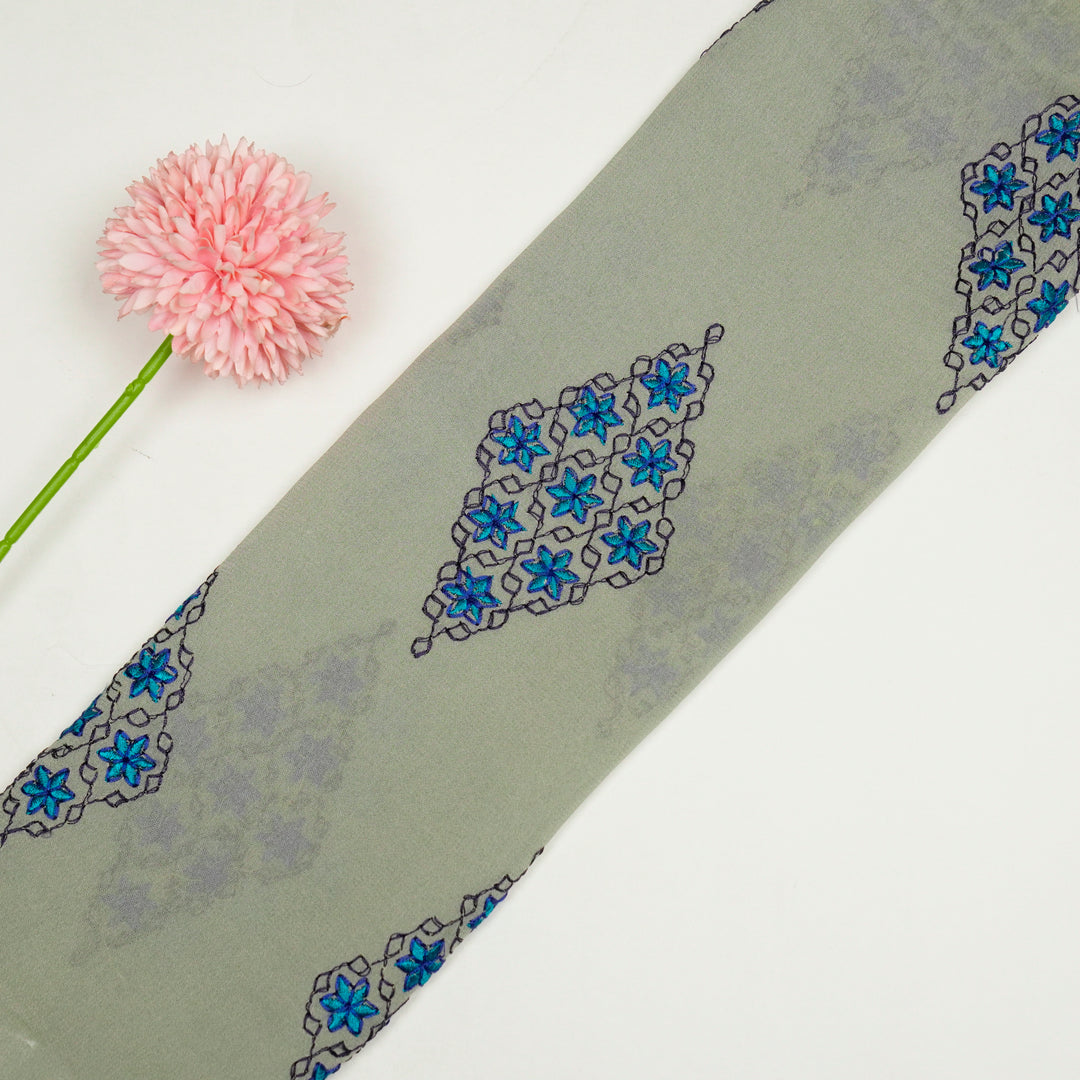 Aseela Buta on Light Grey Semi Georgette Embroidered Fabric