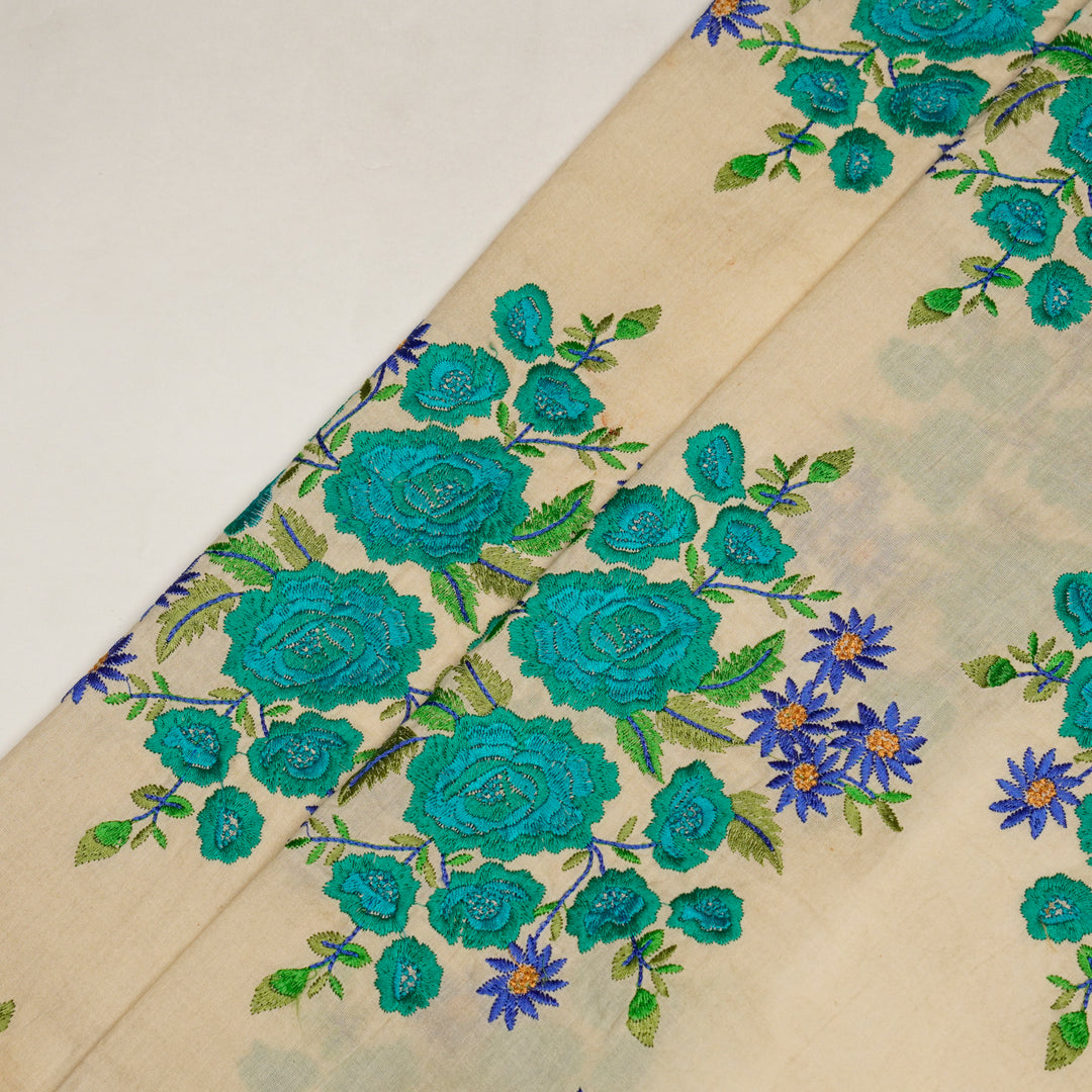 Vasanti Buta on Cream Teal Semi Chanderi Embroidered Fabric