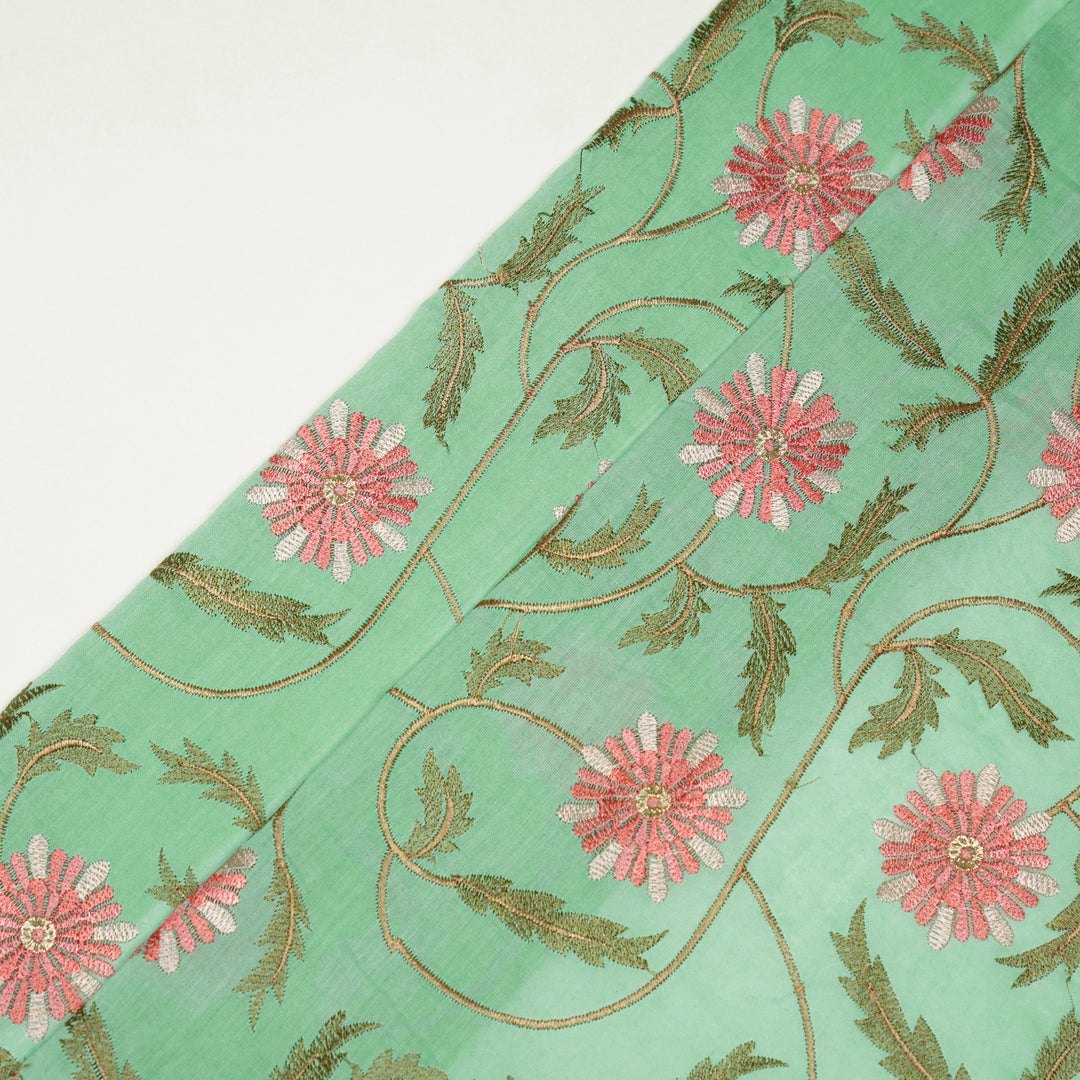 Rajvi Jaal on Mint Green Malmal Embroidered Fabric