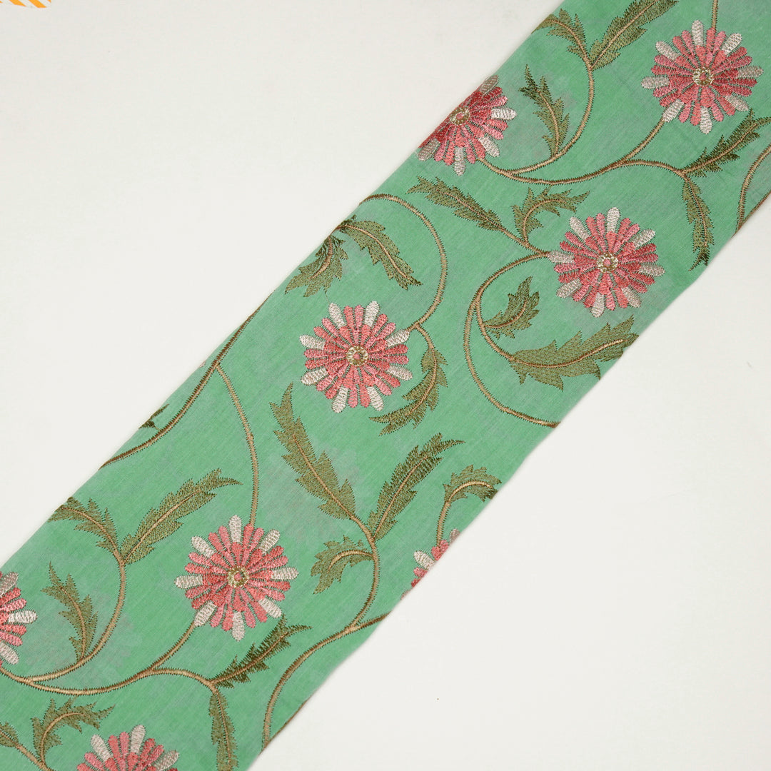 Rajvi Jaal on Mint Green Malmal Embroidered Fabric