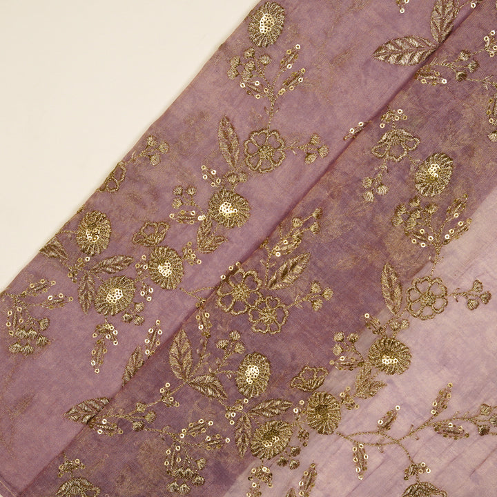 Elira Jaal on Mauve Tissue Embroidered Fabric