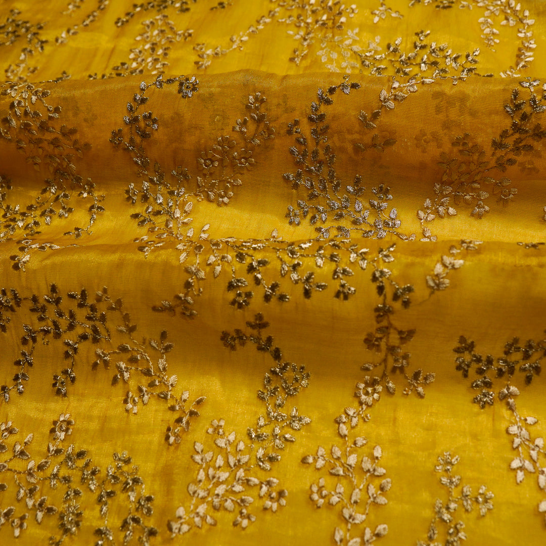 Amoli Jaal on Gold Tissue Embroidered Fabric