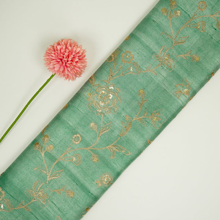 Taraash Jaal on Aqua Raw Silk Embroidered Fabric