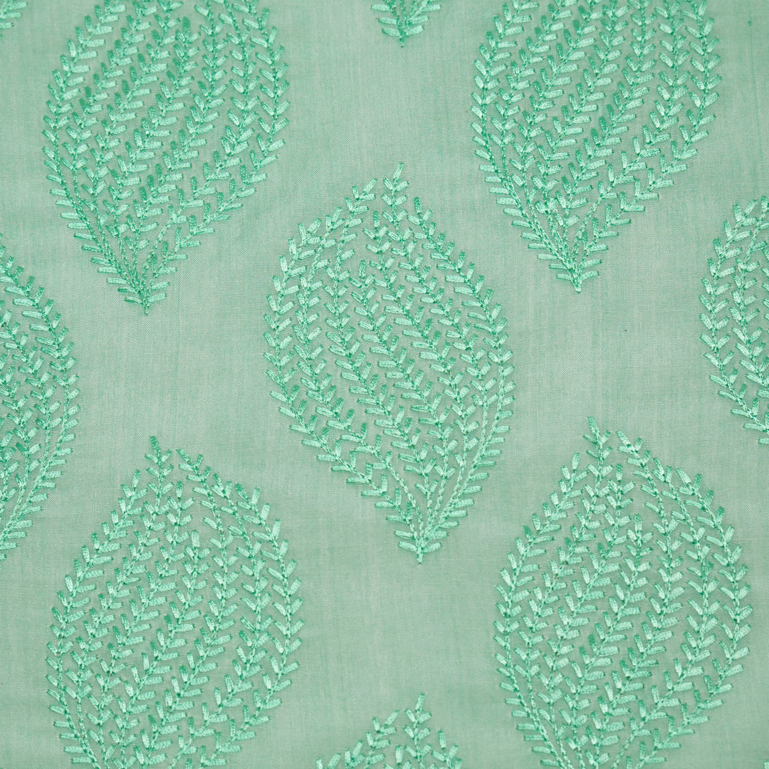 Avira Buta on Mint Green Munga Silk Embroidered Fabric