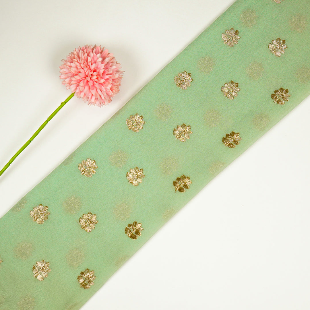 Luma Buti on Sea Green Semi Georgette Embroidered Fabric
