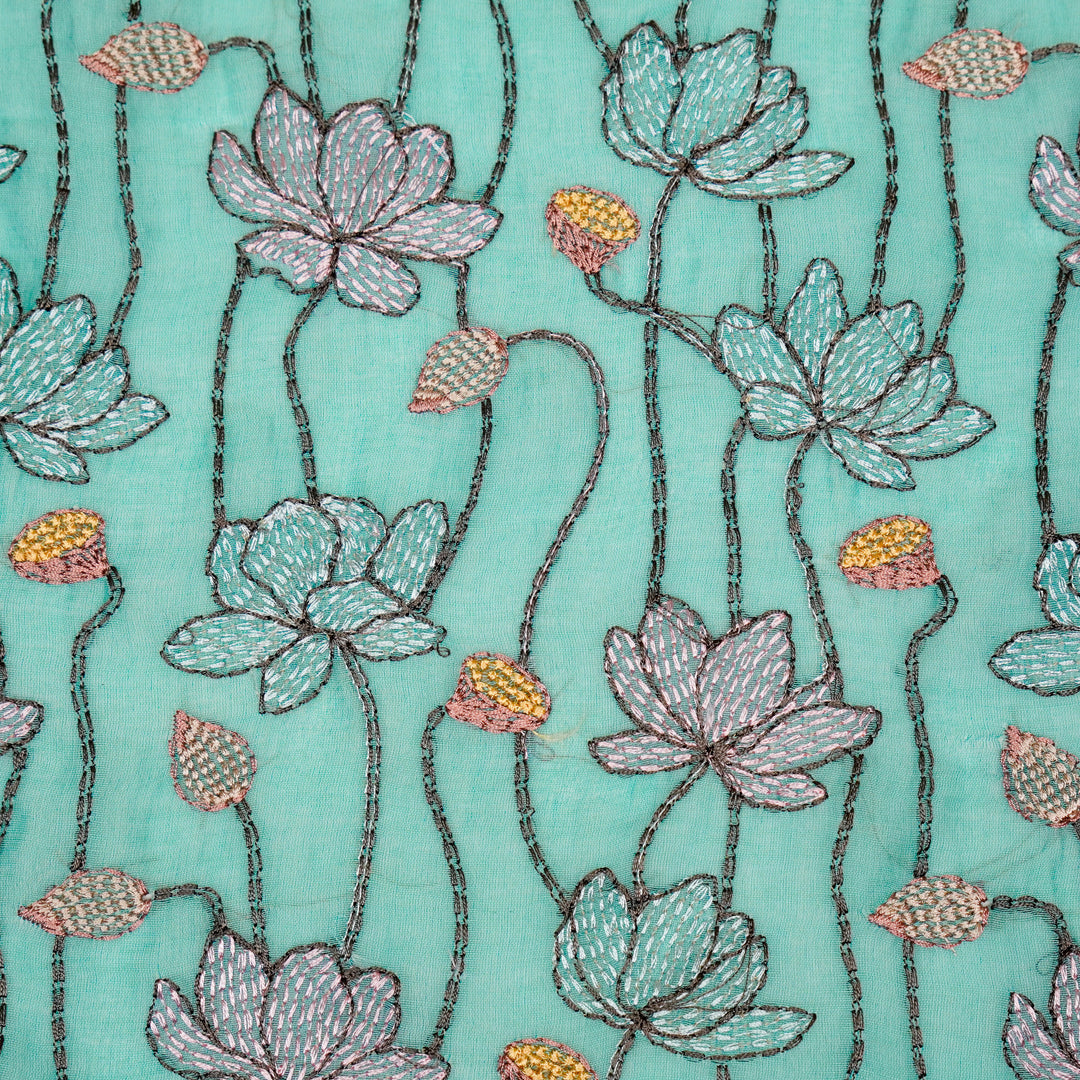Raneem Jaal on Turquoise Cotton Silk Embroidered Fabric