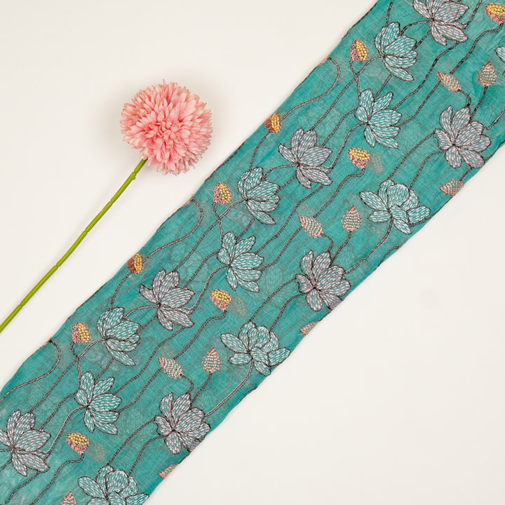 Raneem Jaal on Turquoise Cotton Silk Embroidered Fabric