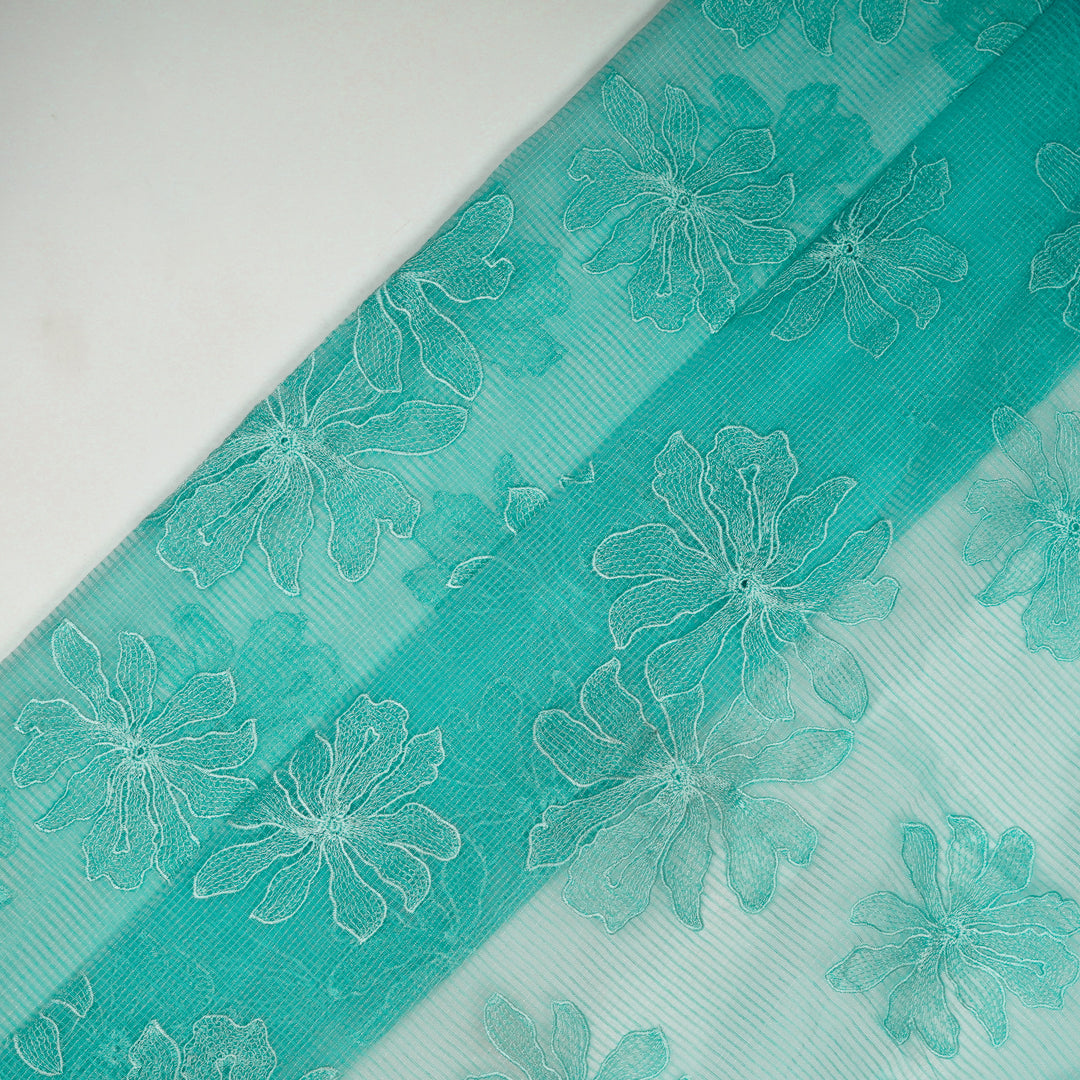 Sabeen Buta on Turquoise Munga Kota  Embroidered Fabric