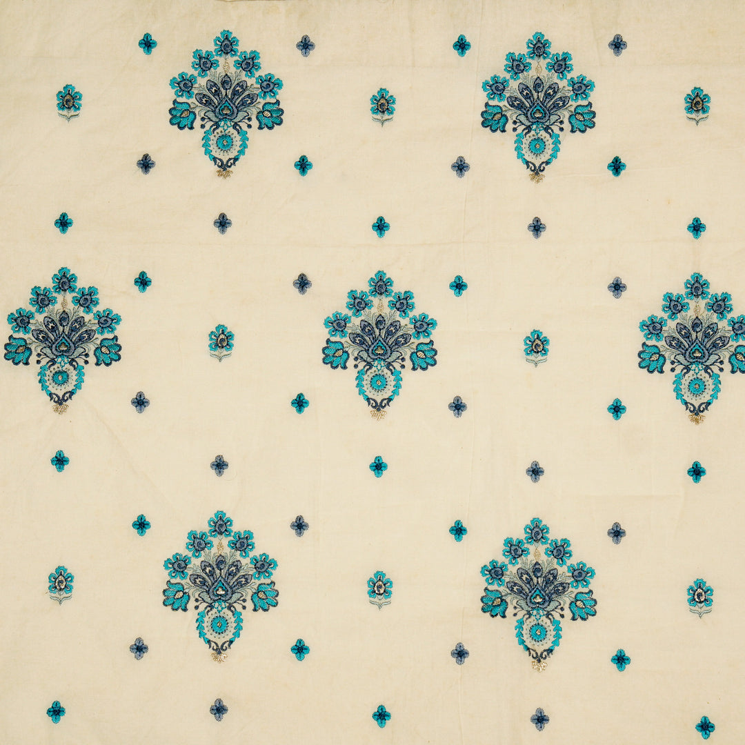 Rituja Buta Buti Mixture on Cream/Blue Malmal Embroidered Fabric