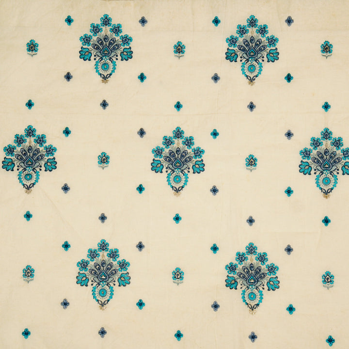 Rituja Buta Buti Mixture on Cream/Blue Malmal Embroidered Fabric