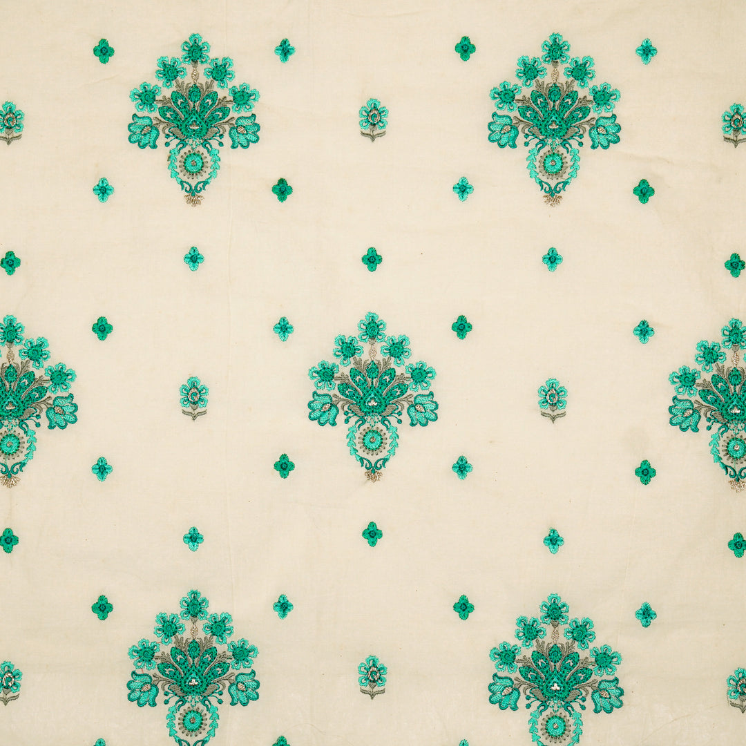 Rituja Buta Buti Mixture on Cream/Teal Malmal Embroidered Fabric