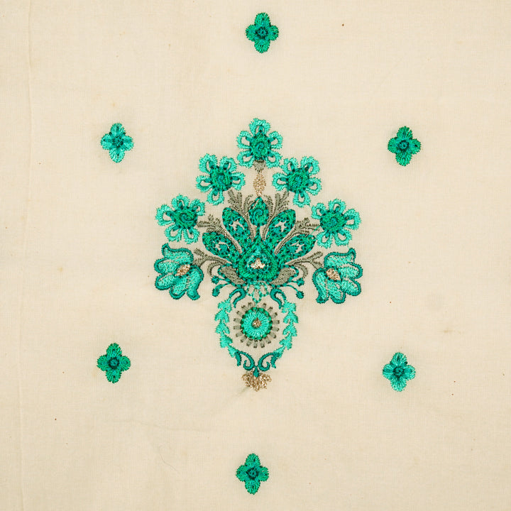 Rituja Buta Buti Mixture on Cream/Teal Malmal Embroidered Fabric