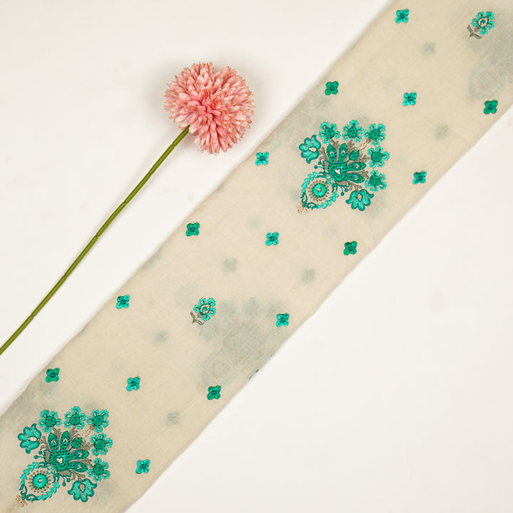 Rituja Buta Buti Mixture on Cream/Teal Malmal Embroidered Fabric