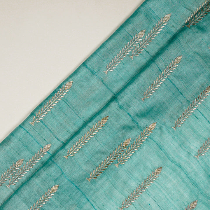 Arika Buta on Turquoise Tussar Silk Embroidered Fabric