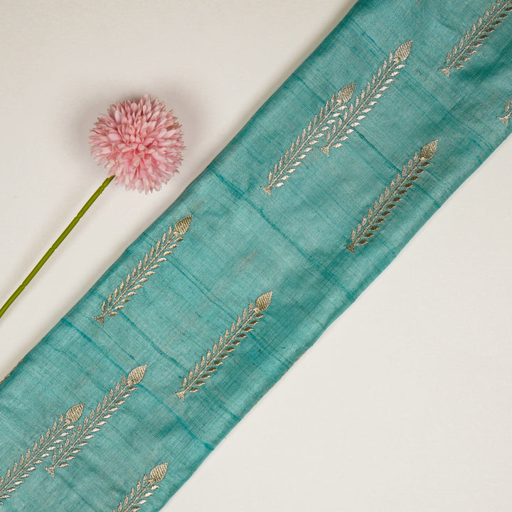 Arika Buta on Turquoise Tussar Silk Embroidered Fabric