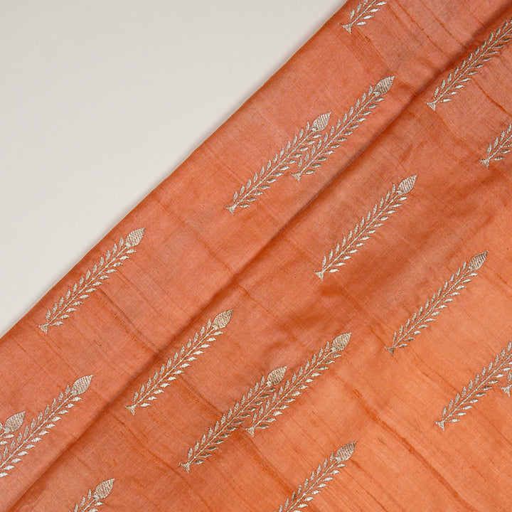 Arika Buta on Deep Peach Tussar Silk Embroidered Fabric