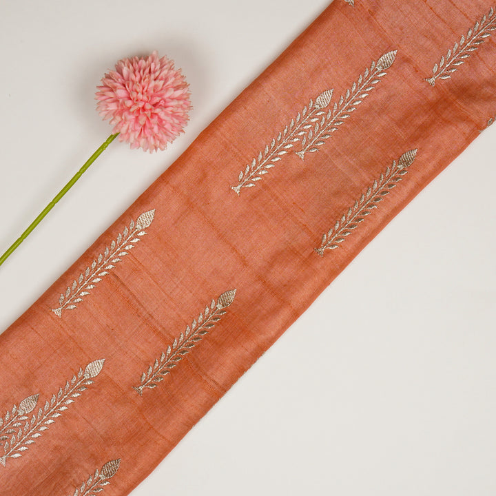 Arika Buta on Deep Peach Tussar Silk Embroidered Fabric