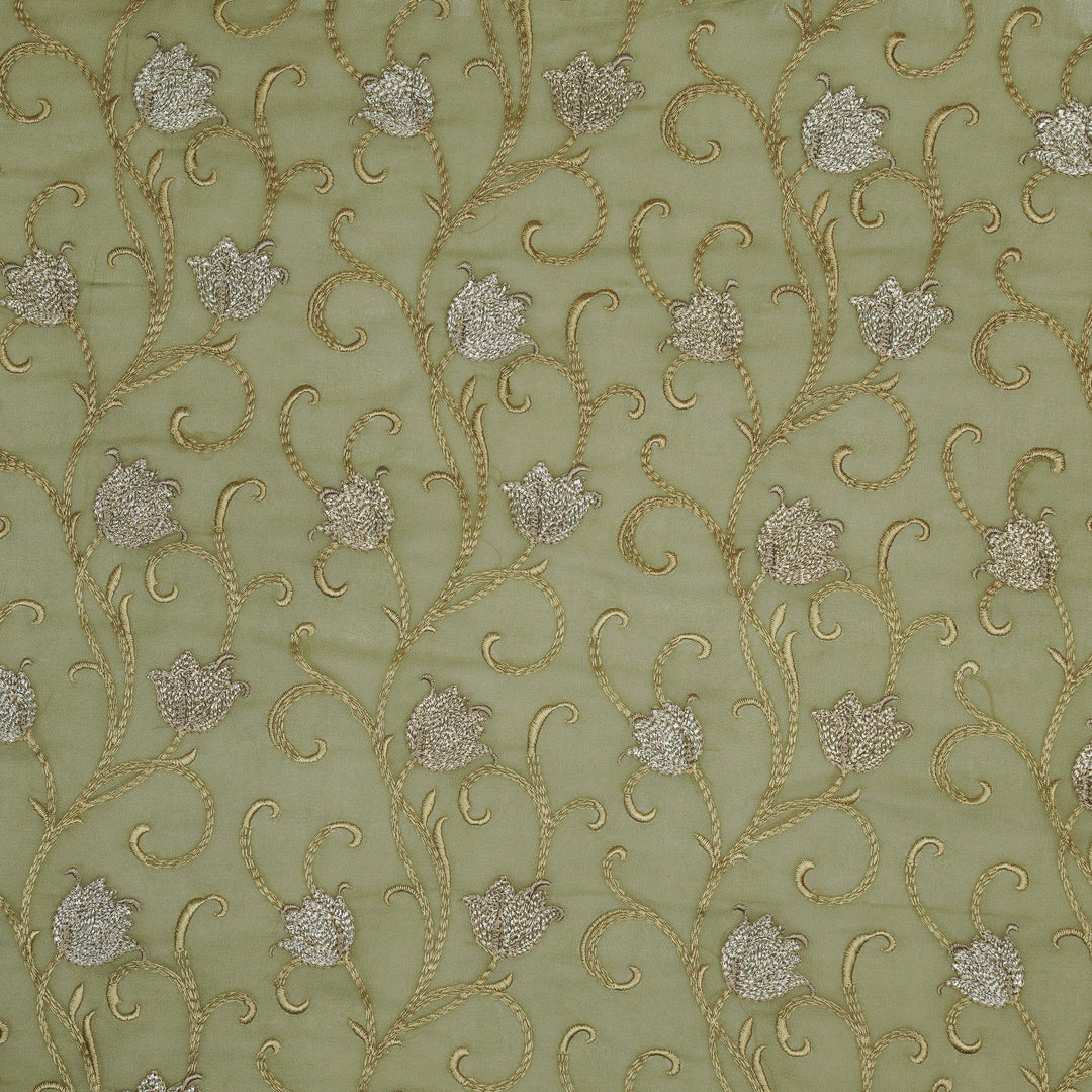Tamira Jaal on Light Olive Semi Georgette Embroidered Fabric
