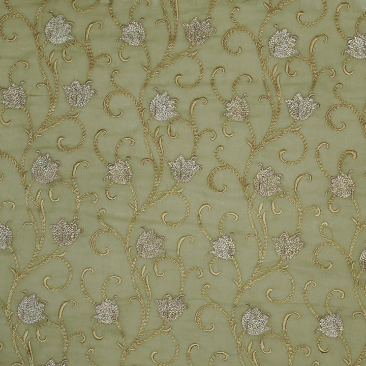 Tamira Jaal on Light Olive Semi Georgette Embroidered Fabric