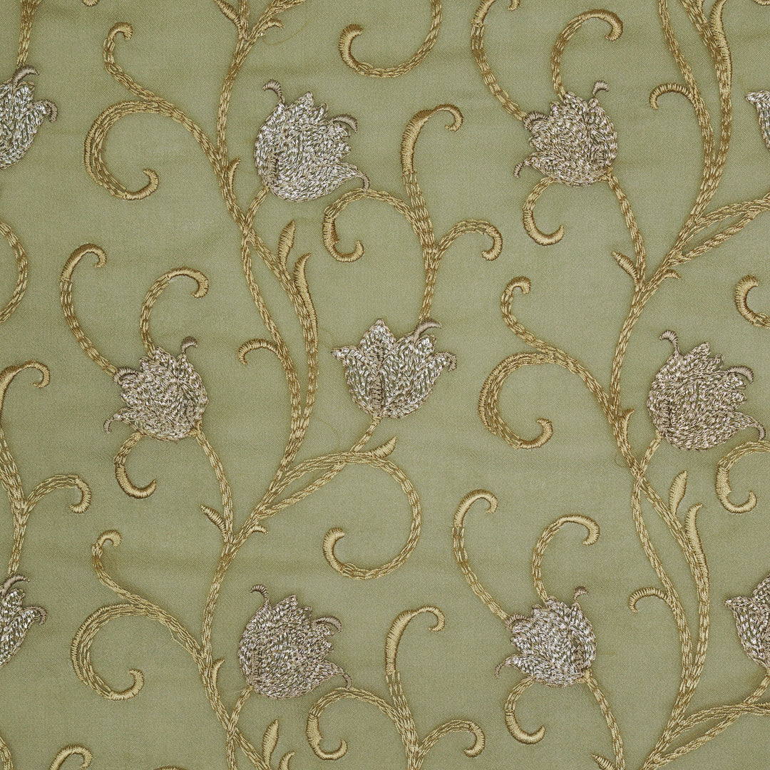Tamira Jaal on Light Olive Semi Georgette Embroidered Fabric