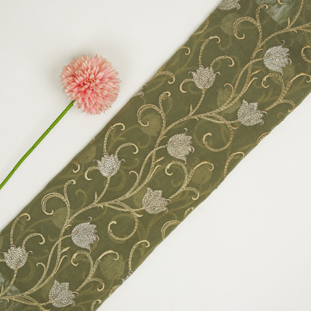 Tamira Jaal on Light Olive Semi Georgette Embroidered Fabric