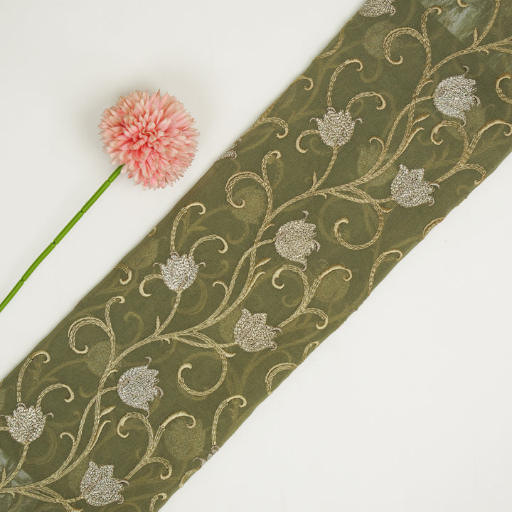 Tamira Jaal on Light Olive Semi Georgette Embroidered Fabric