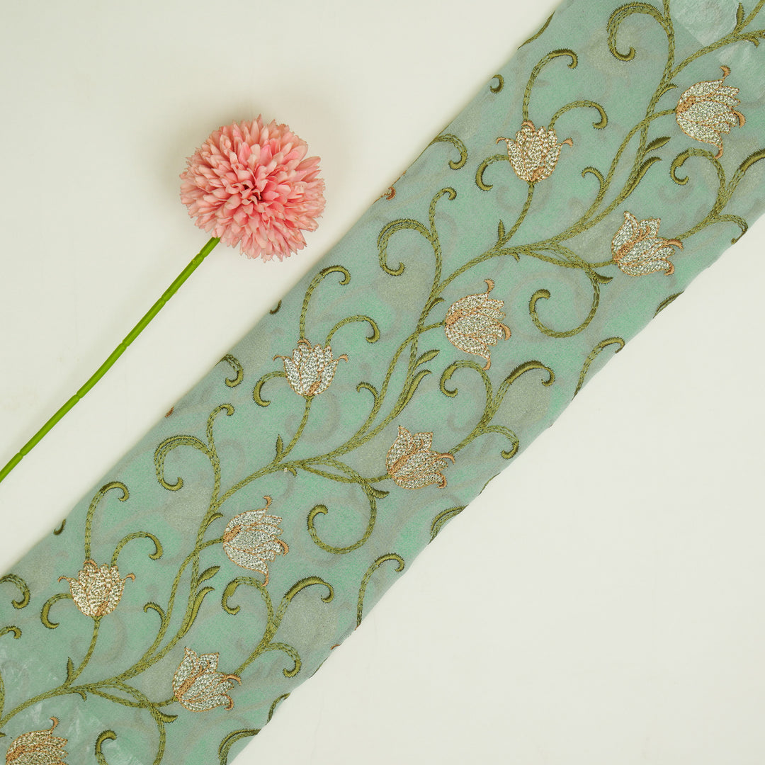 Tamira Jaal on Light Aqua Semi Georgette Embroidered Fabric