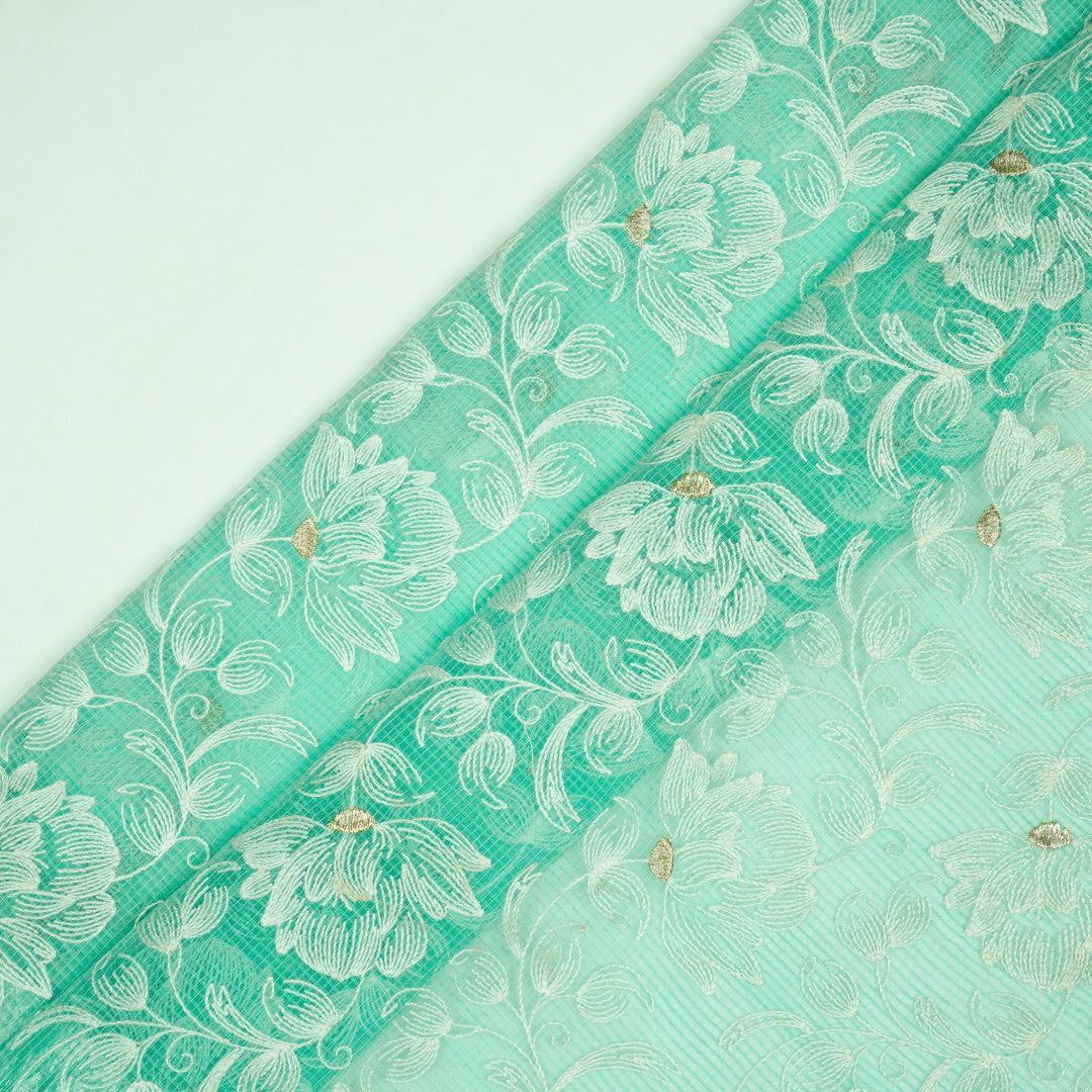 Geetika Jaal on Sea Green Munga Kota Embroidered Fabric