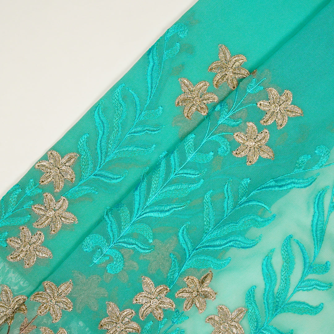 Dalisha Jaal on Aqua Semi Georgette Embroidered Fabric